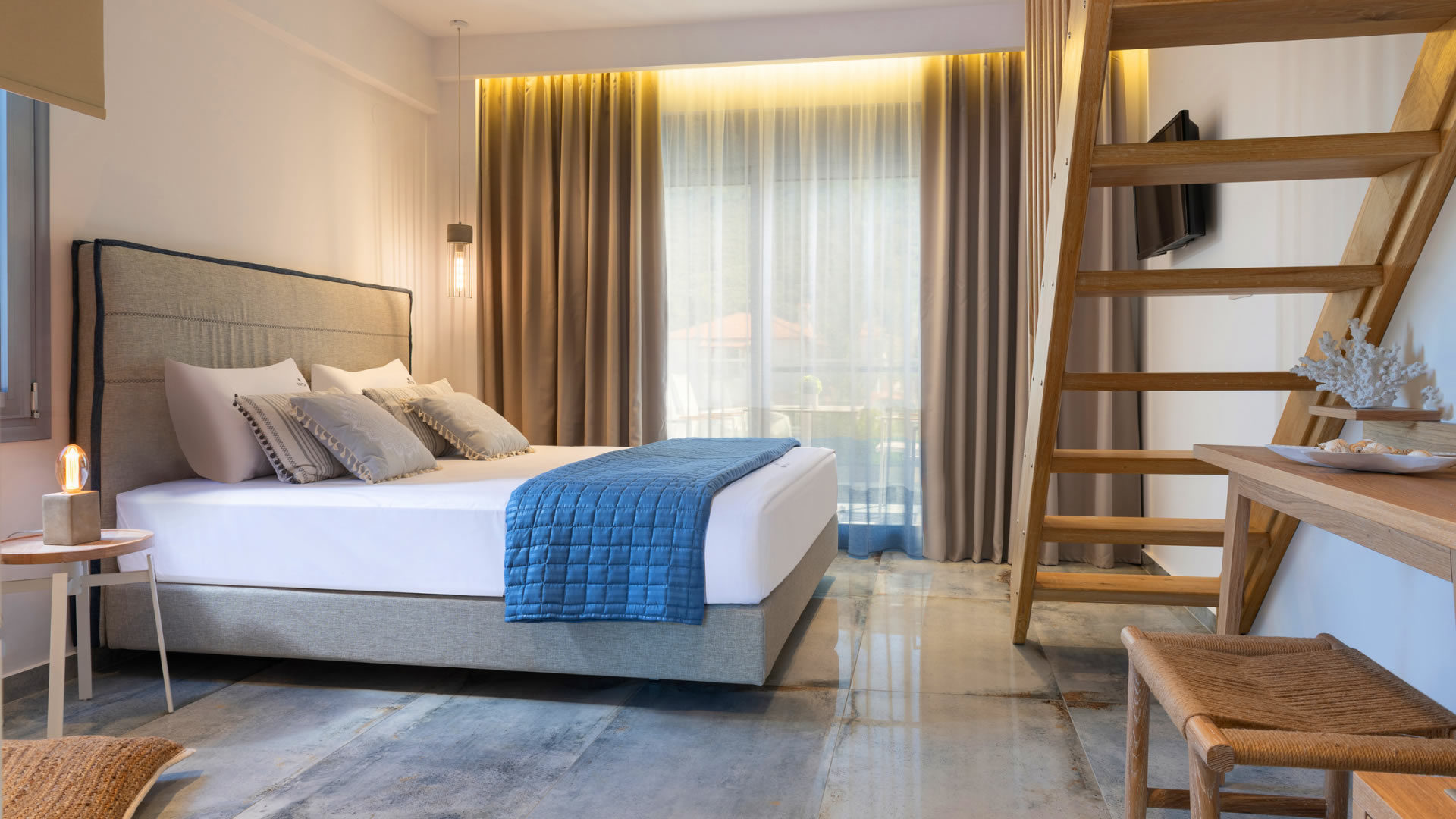 Bedroom with white and blue linens