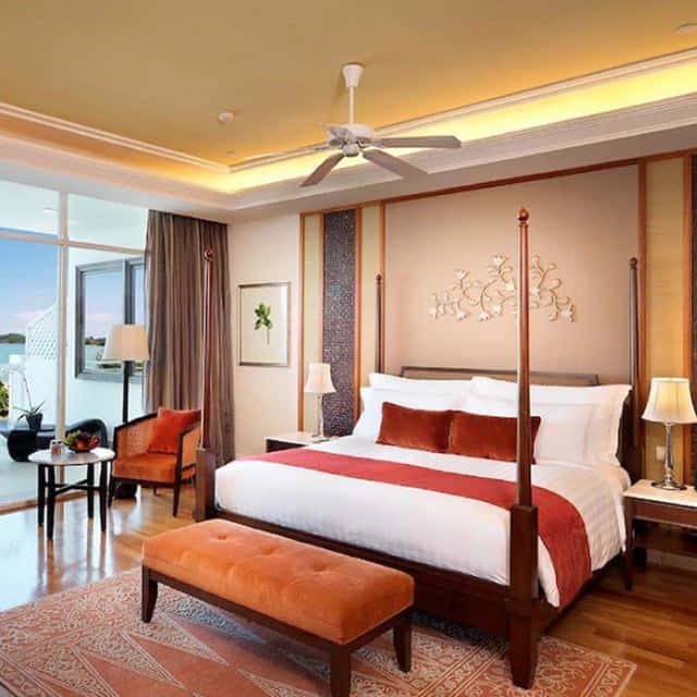 bedroom with white and brown linens